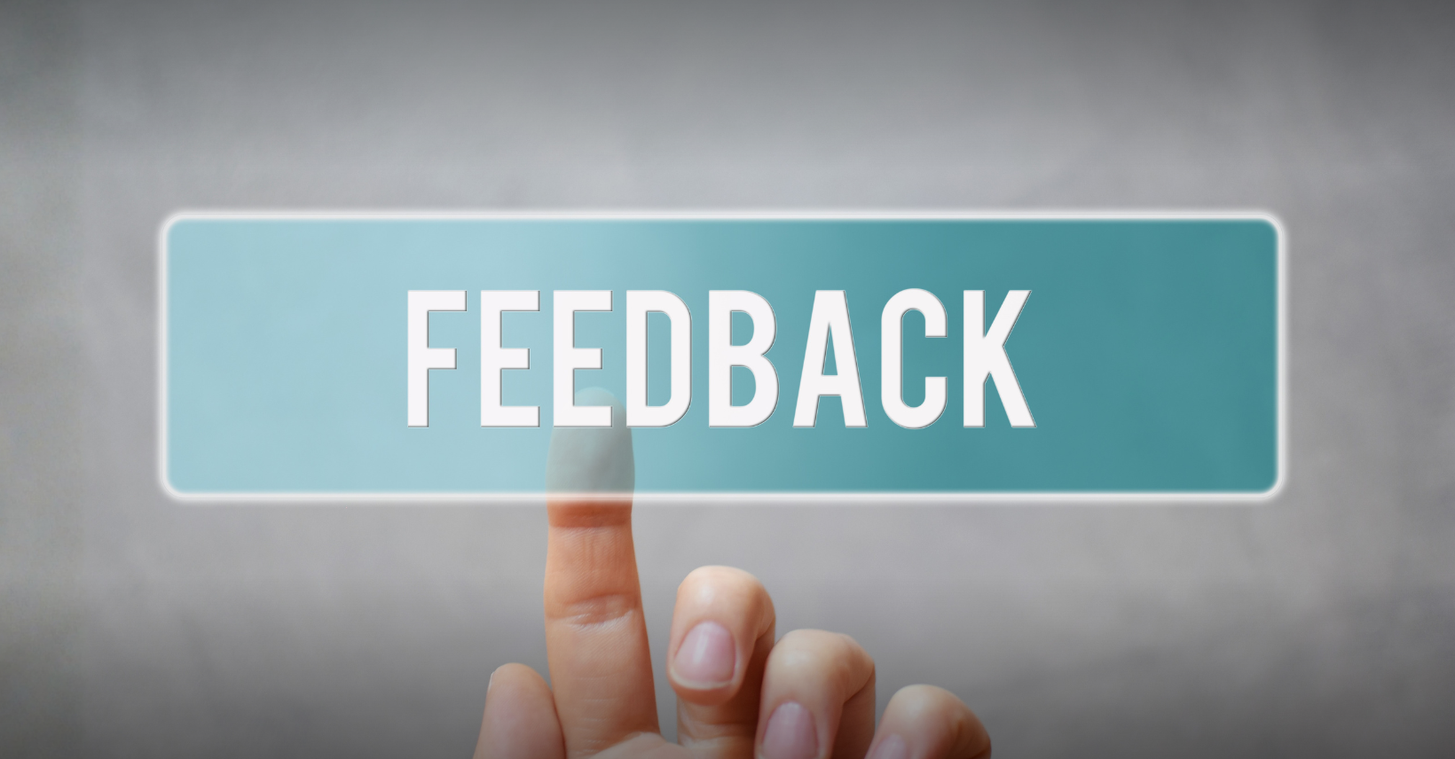 How To Ask For Website Testimonials Without Making It Weird Finger pressing a digital feedback button to illustrate how to ask for website testimonials from happy clients